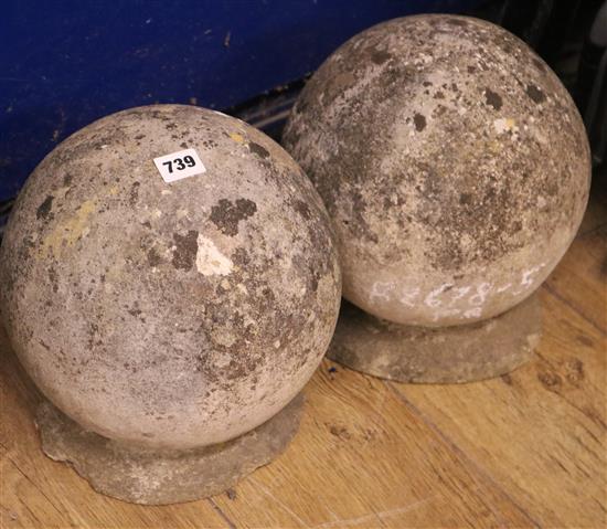 A pair of stone ball finials, approx. H.28cm